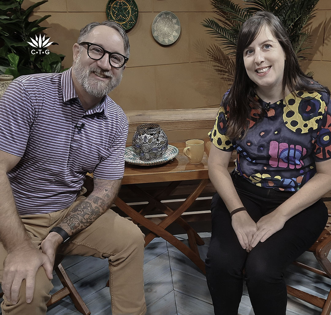 man and woman on TV set
