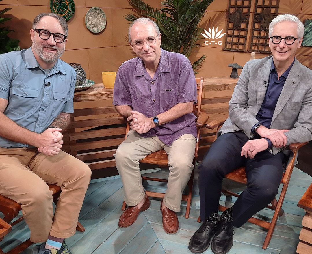 three men on TV set 