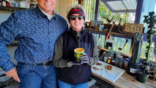 man and woman in potting shed